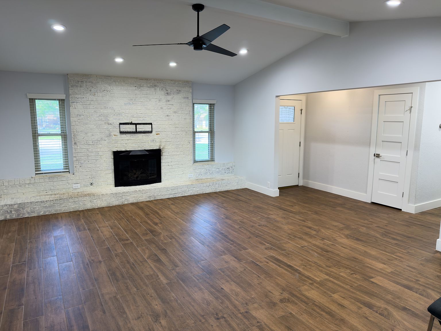 Living room with stone fireplace